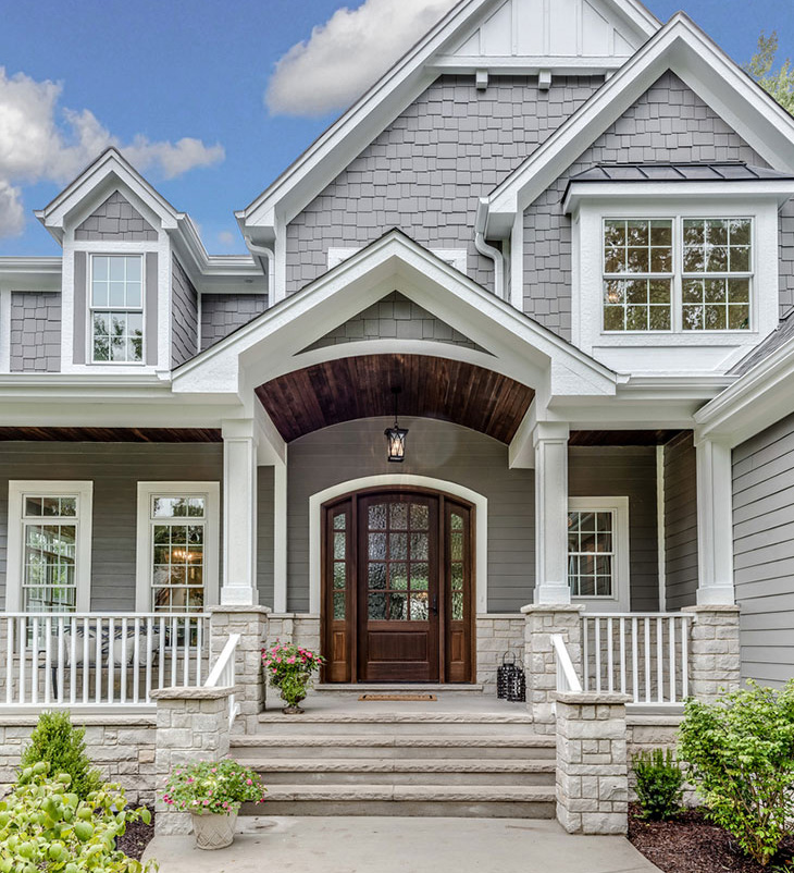 Front View of a Family Home After Siding and Roofing Work